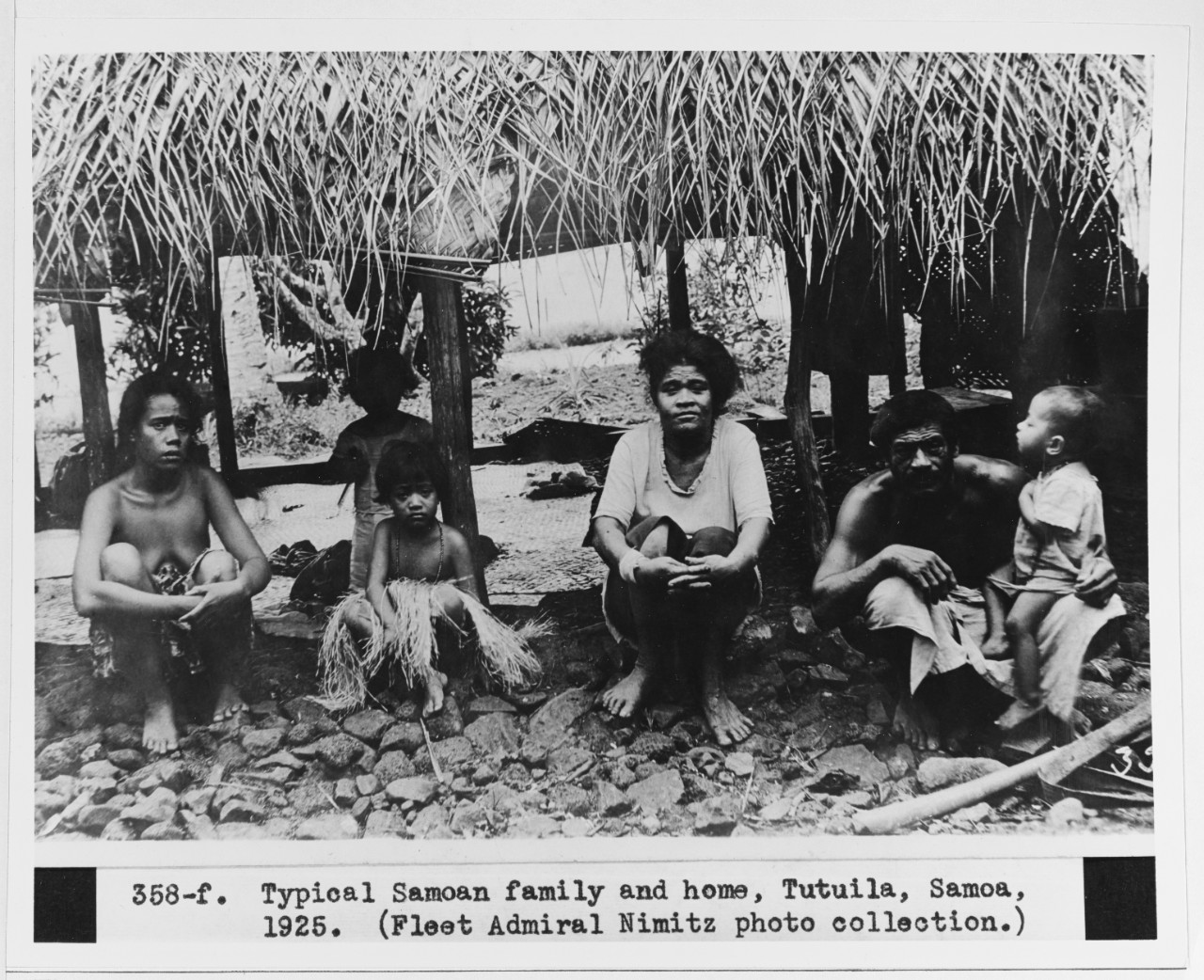 A typical native house and family at Tutulia, Samoa, 1925.