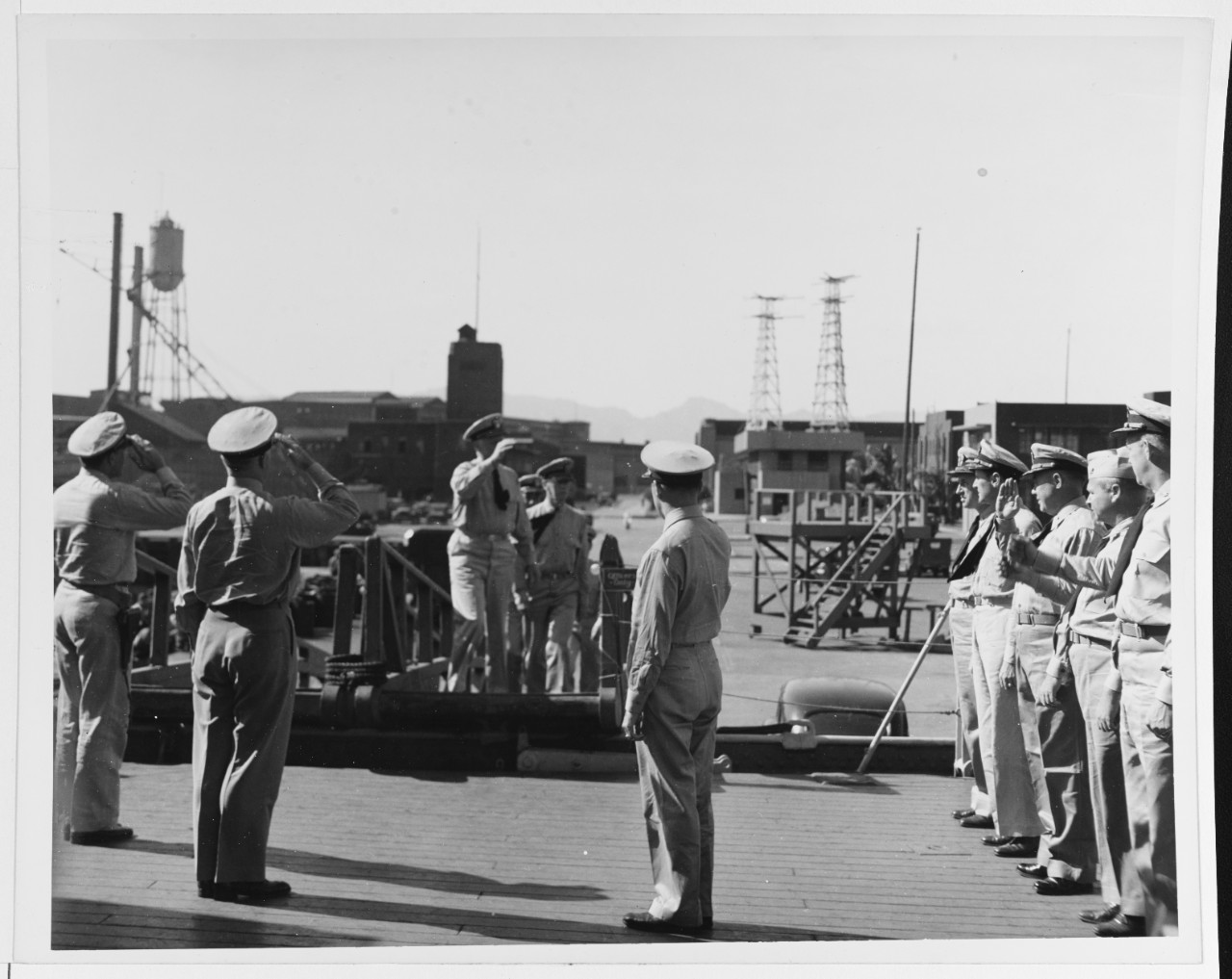 Fleet Admiral Chester W. Nimitz, USN, CinCPac-POA, goes on board USS WISCONSIN (BB-64).