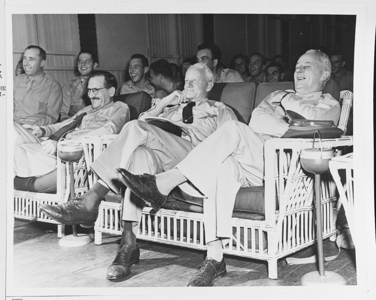 Admiral Chester W. Nimitz (CinCPac-POA) and Lt. Gen. Elos C. Emmons, USN, enjoy a movie or play.