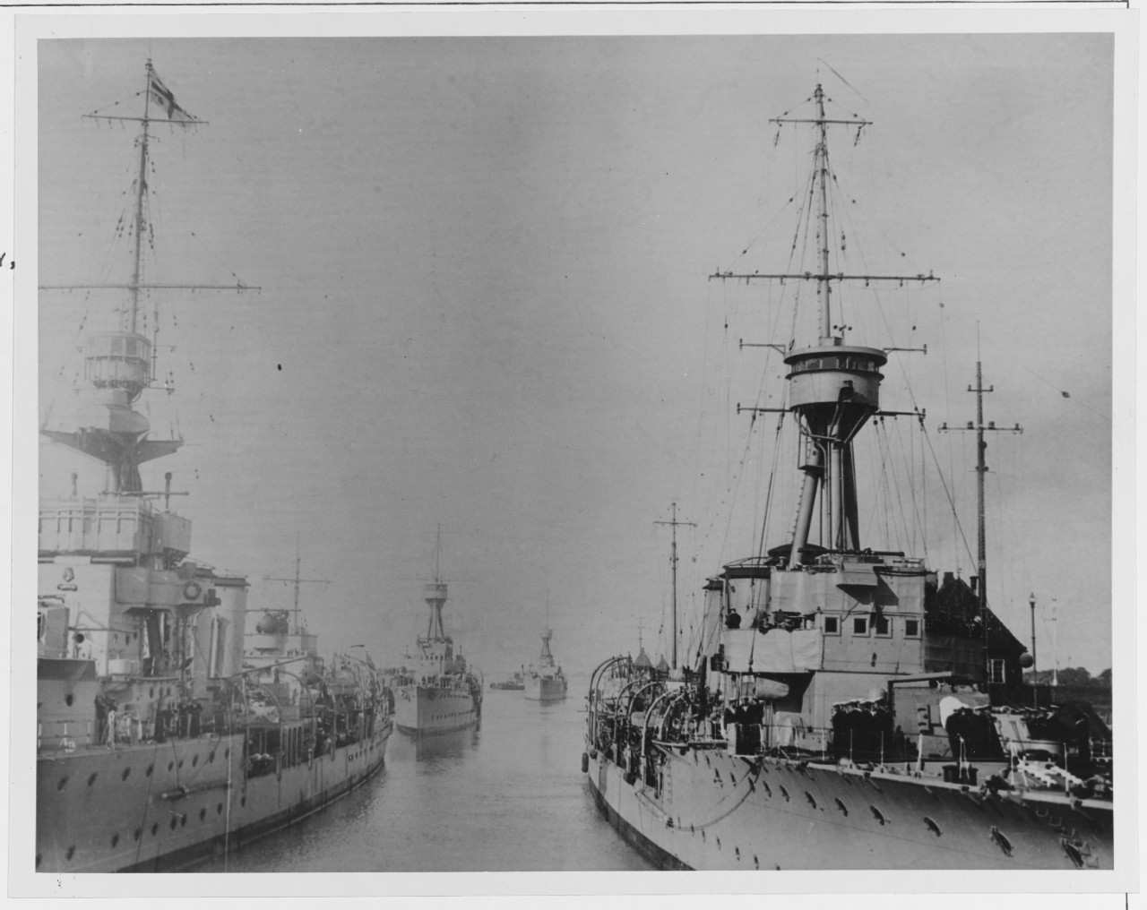 HMS CURACOA (Left), COMUS (right), CAMBRIAN, & CANTERBURY (Astern)