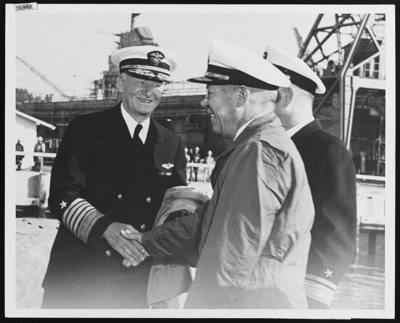 Fleet Admiral C.W. Nimitz, USN, Greets Admiral F.S. Low, USN, On Board USS NAUTILUS (SSN-571)