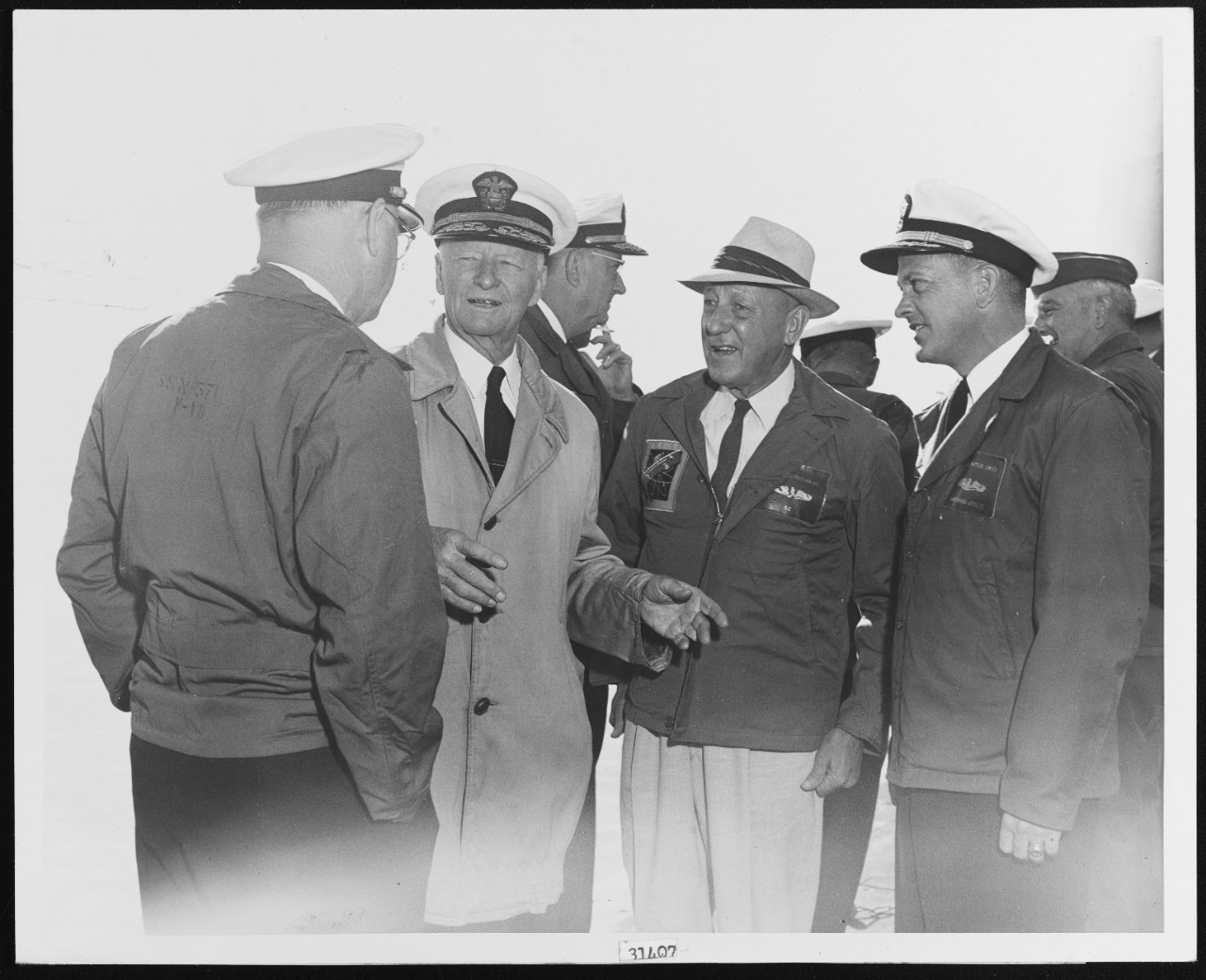 Fleet Admiral Nimitz, USN, and Other Officers Converse Aboard USS NAUTILUS (SSN-571)