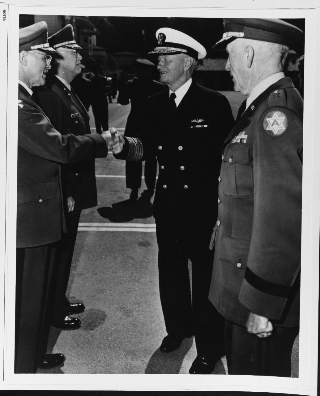 Major General John J. Binns, Sixth U.S. Army, introduces Fleet Admiral Nimitz, USN, to Colonel R.G. Miller