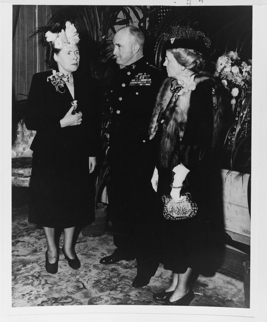 Mrs. Chester W. Nimitz Chats with General and Mrs. A.A. Vandegrift