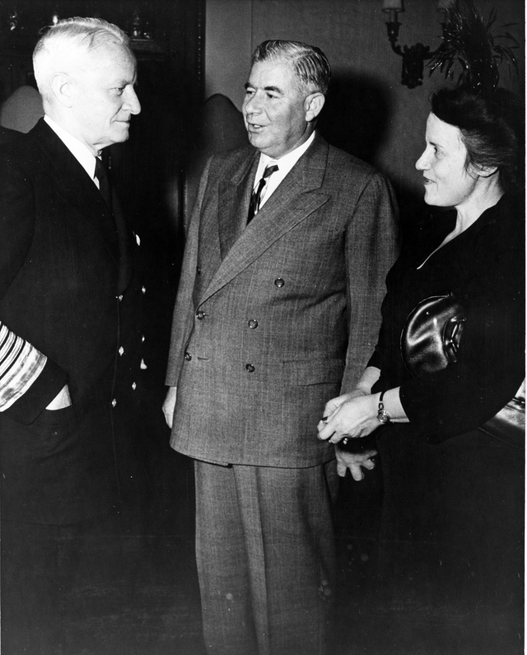 Admiral Nimitz chats with guests at farewell retirement party