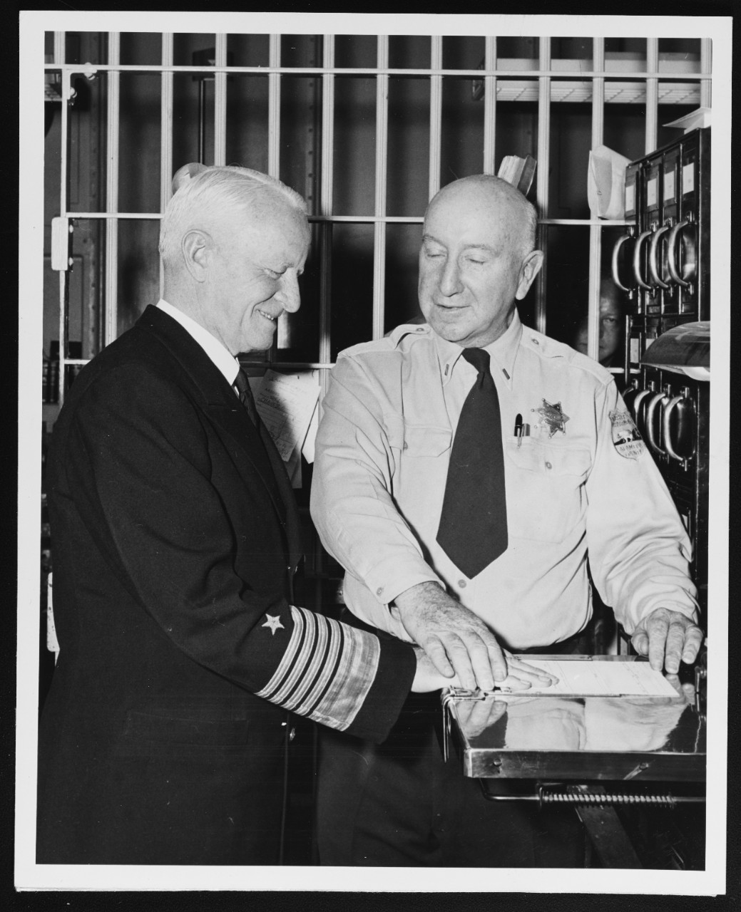 Fleet Admiral Nimitz is Fingerprinted