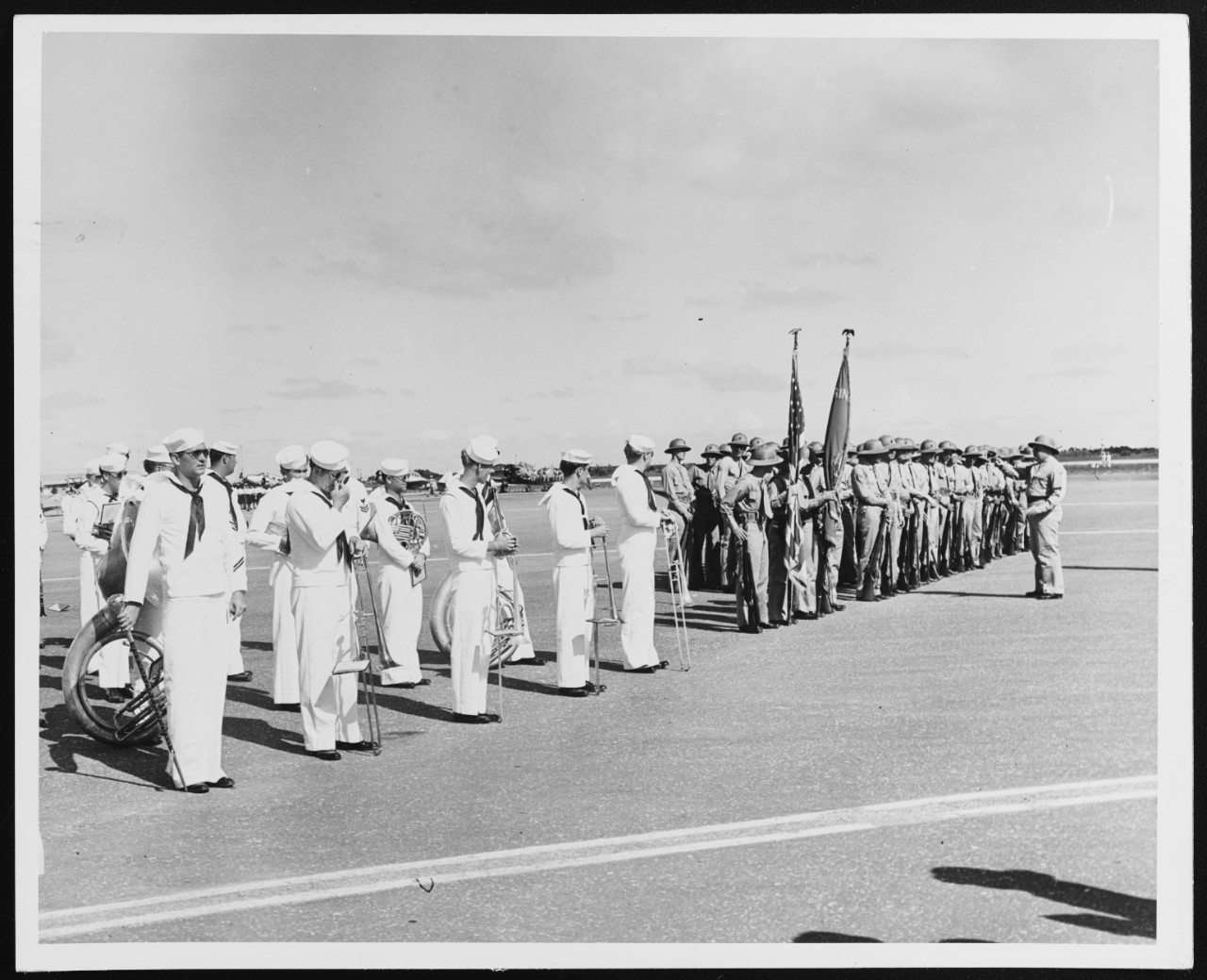 A Navy Band and Servicemen
