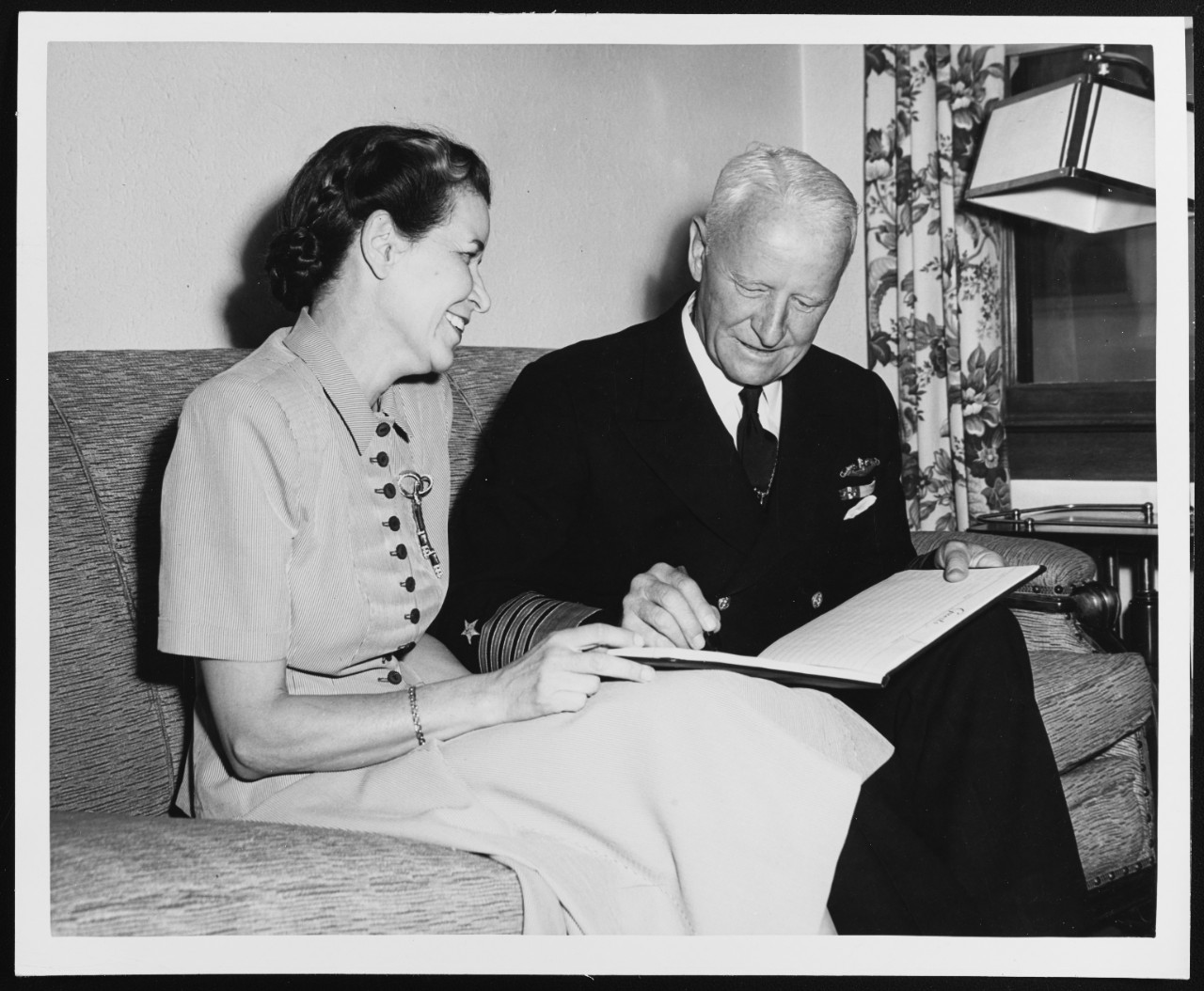 Fleet Admiral Nimitz Signs a Guest Book