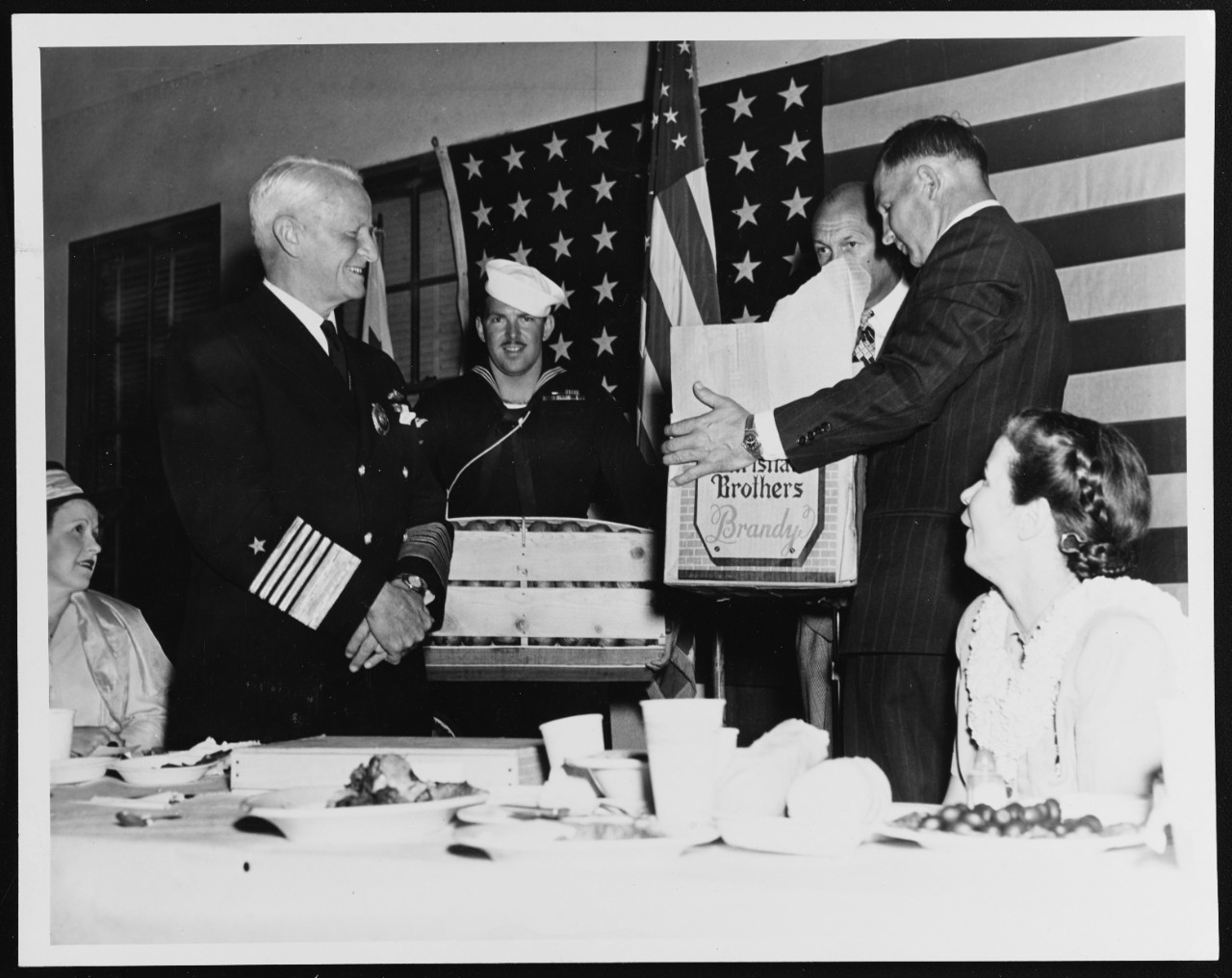 Fleet Admiral Nimitz is Presented with Crates of Fruits and Vegetables