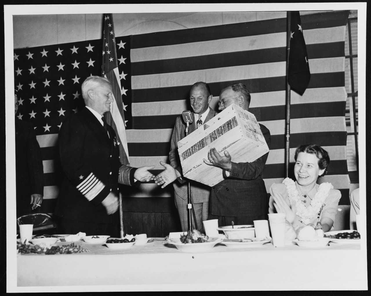 Fleet Admiral Nimitz is Presented with a Crate of Vegetables
