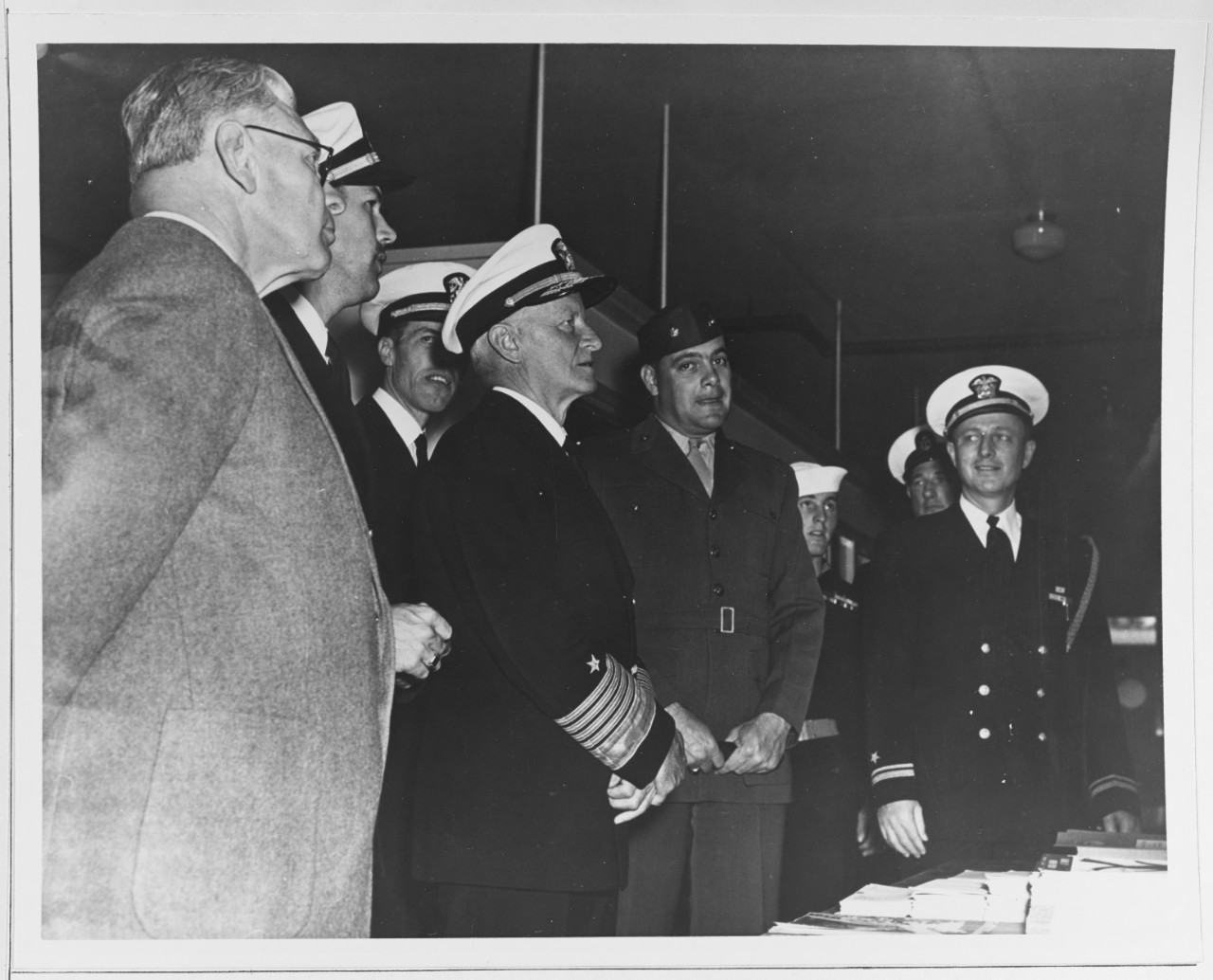 Fleet Admiral Nimitz Inspects a Bulletin Board during a Visit to the Naval Reserve Training Center, Fresno
