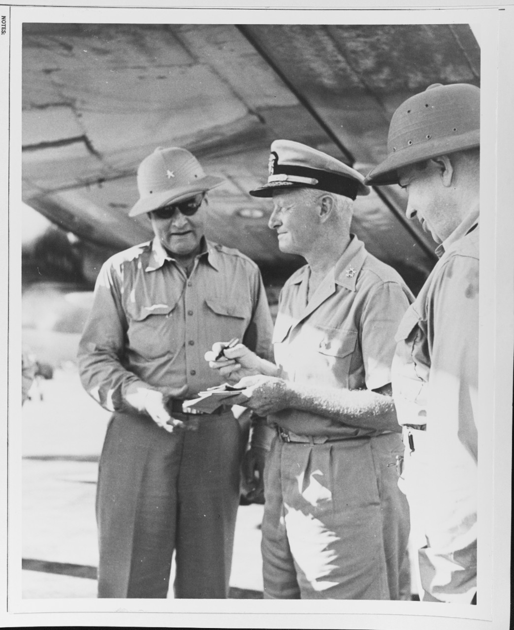Fleet Admiral Nimitz Signs a "Short-Snorter" Dollar Bill