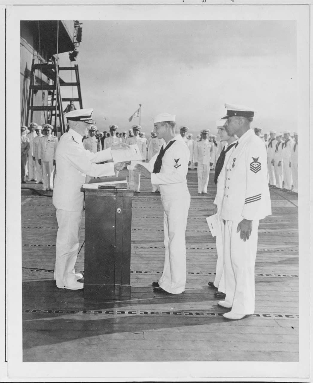 Admiral Nimitz Awards Commendation Letters to Servicemen aboard USS ENTERPRISE