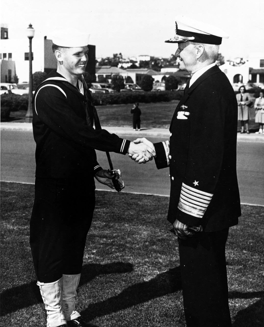 Fleet Admiral Nimitz, Shakes Hands with a Young Navy Recruit