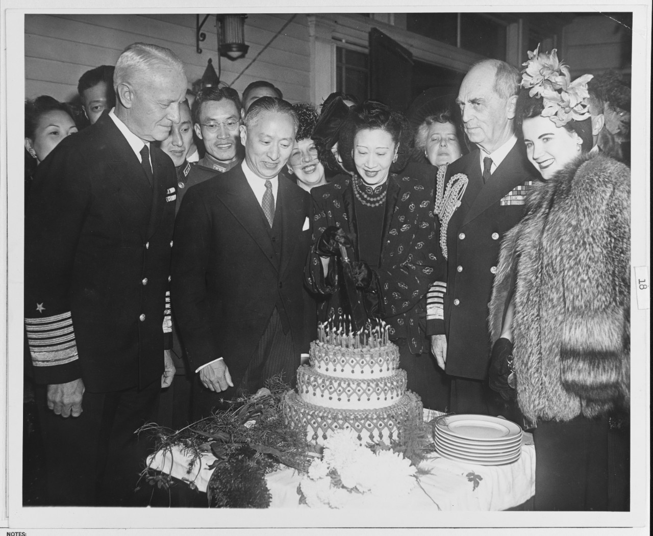 Mrs. Koo, Wife of the Chinese Ambassador, Cuts the Cake
