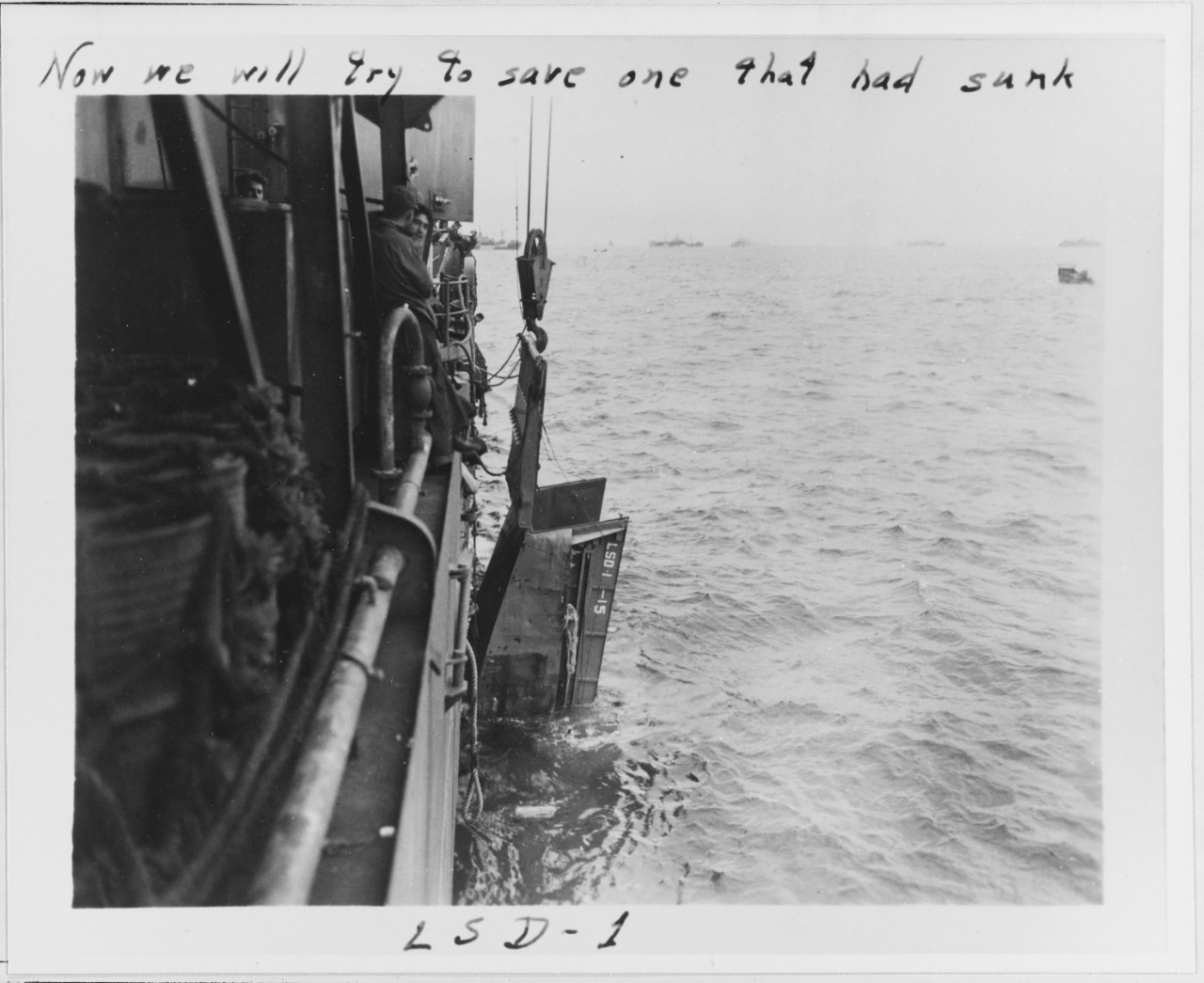 Attempts to salvage LCVP aboard USS ASHLAND (LSD-1)