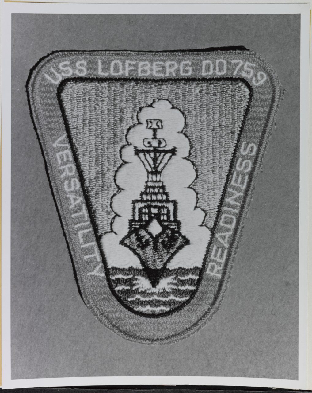 Insignia:  USS LOFBERG (DD-759)