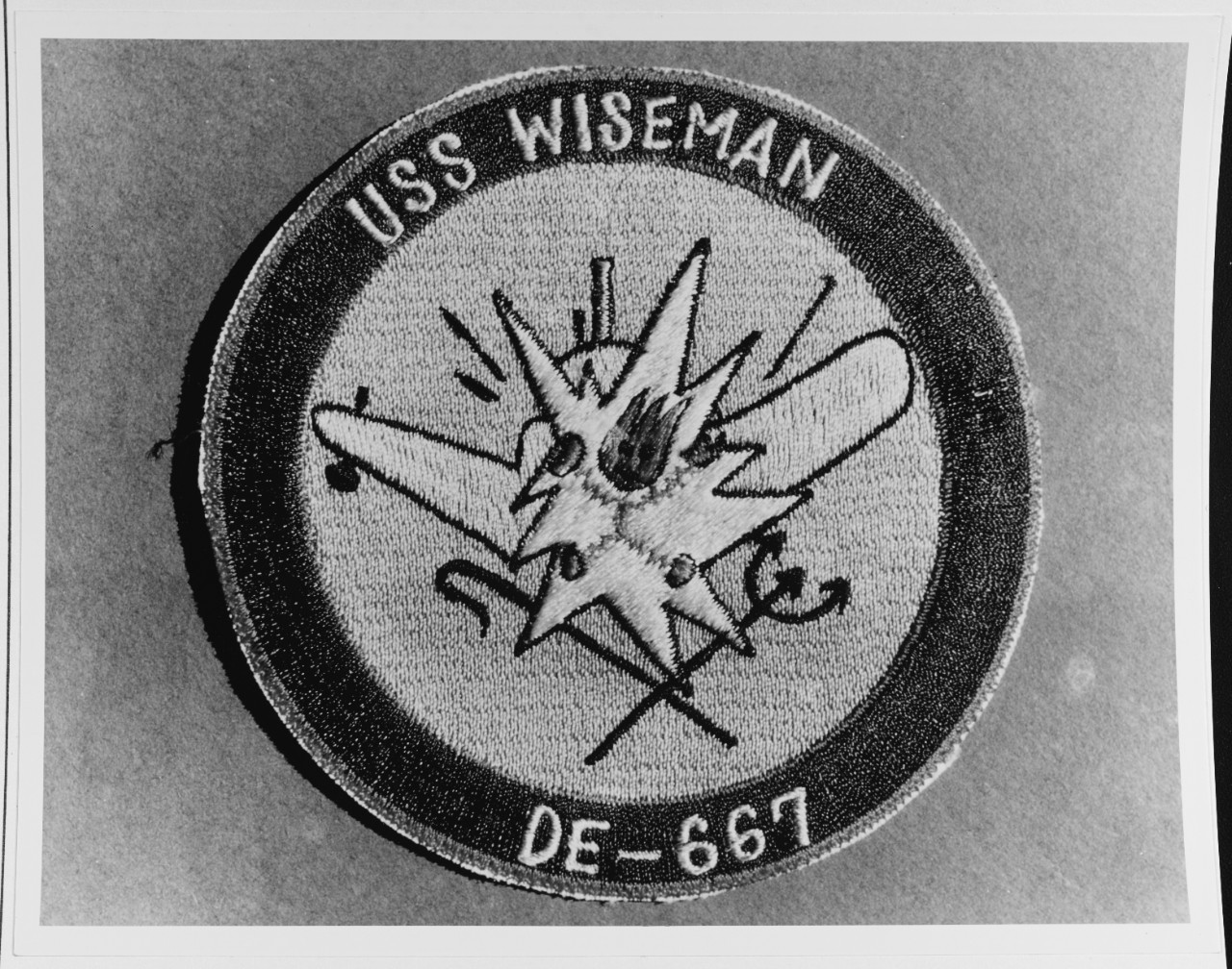 Insignia:  USS WISEMAN (DE-667)