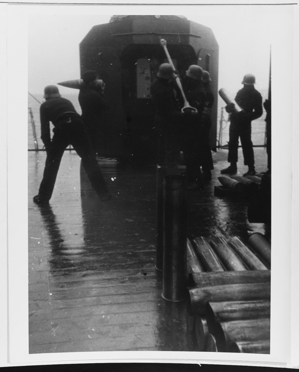 German crew firing 15cm single gun.