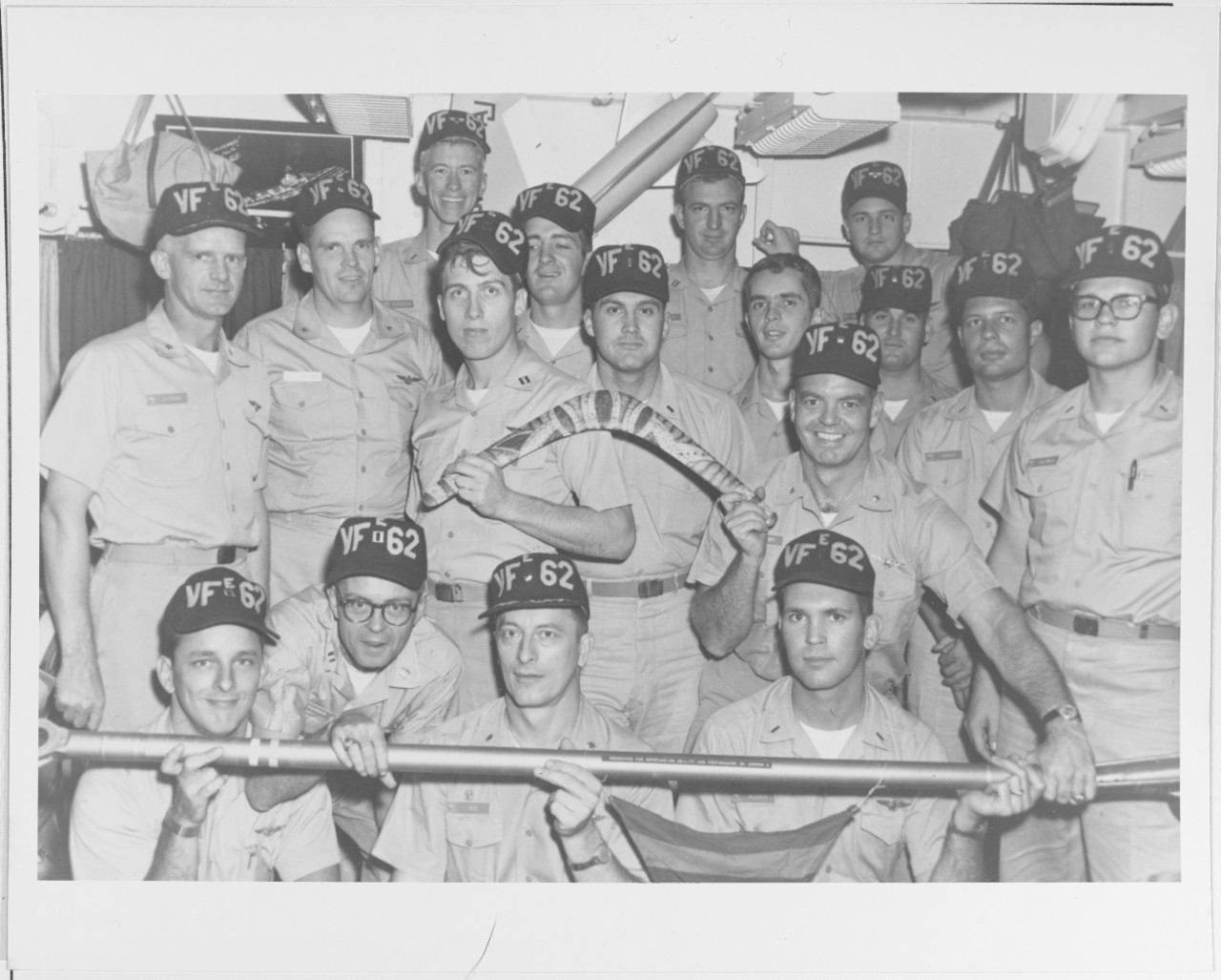Officers of VF-62 with their trademark Boomerang being awarded the golden hook