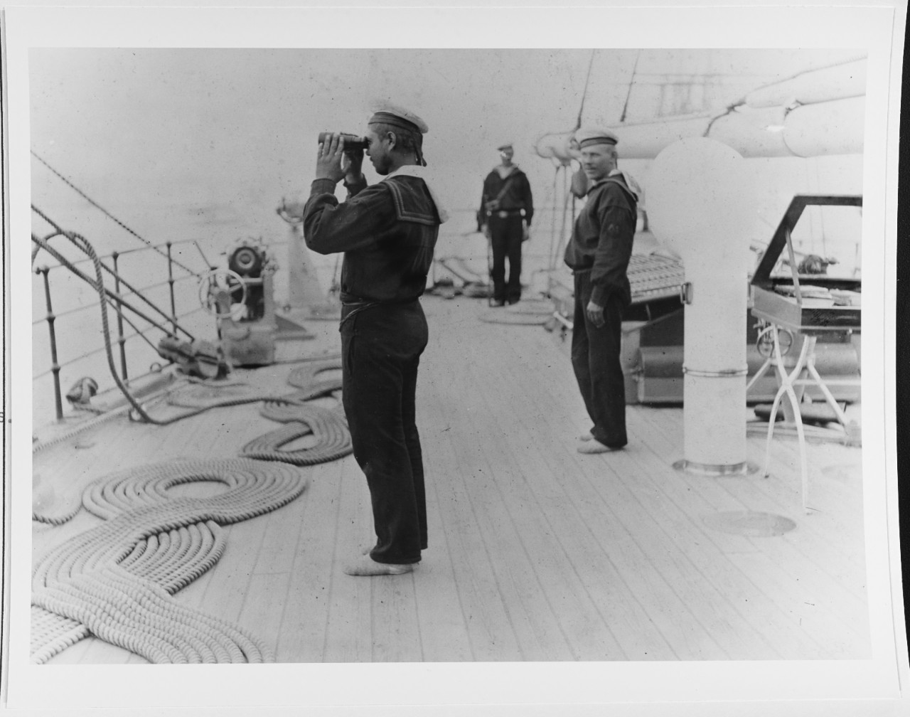 Russian sailors on the quarter deck of their cruiser