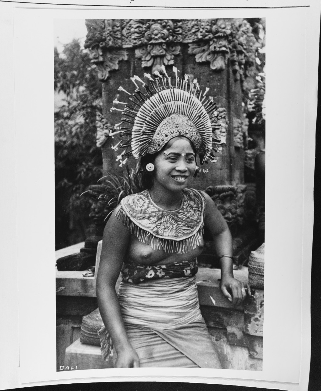 Girl on the Island of Bali in ceremonial costume.