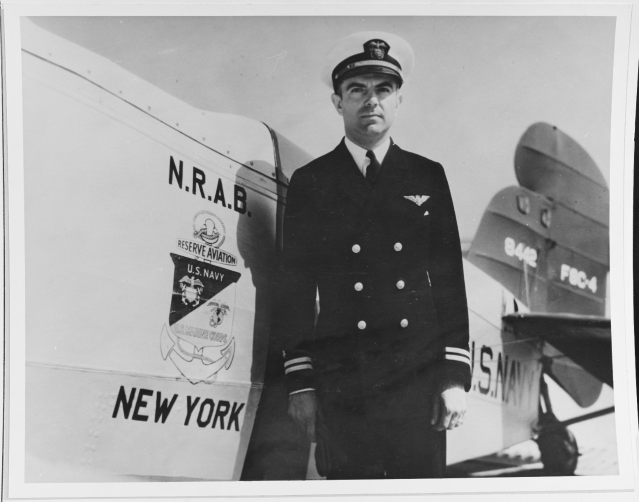 Lieutenant Allison, USN, Commanding Officer of the Naval Reserve Air Base, Floyd Bennett Field, New York.