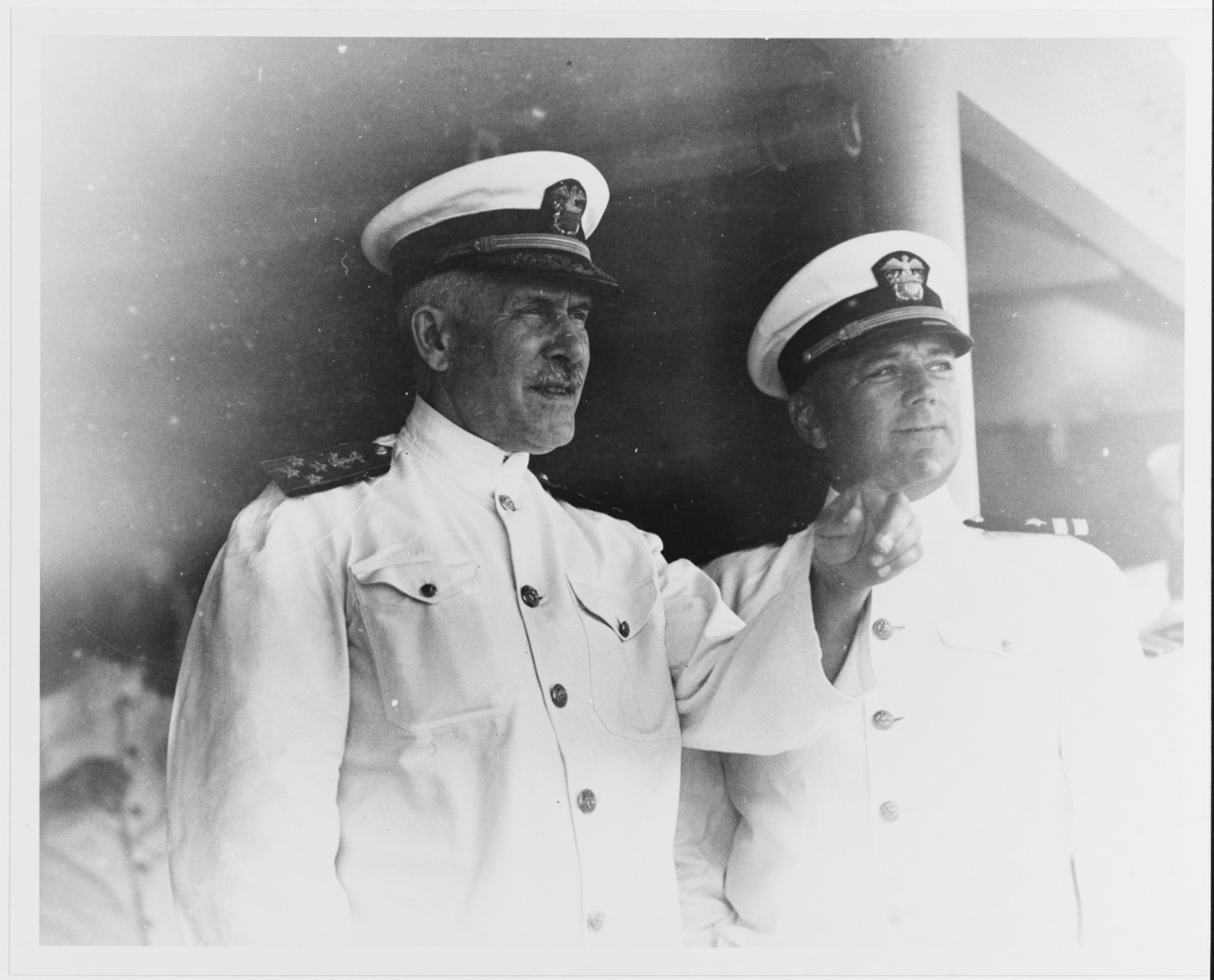 Admiral William V. Pratt, USN, and Lieutenant Charles W.A. Campbell, Admiral Pratt's aide.