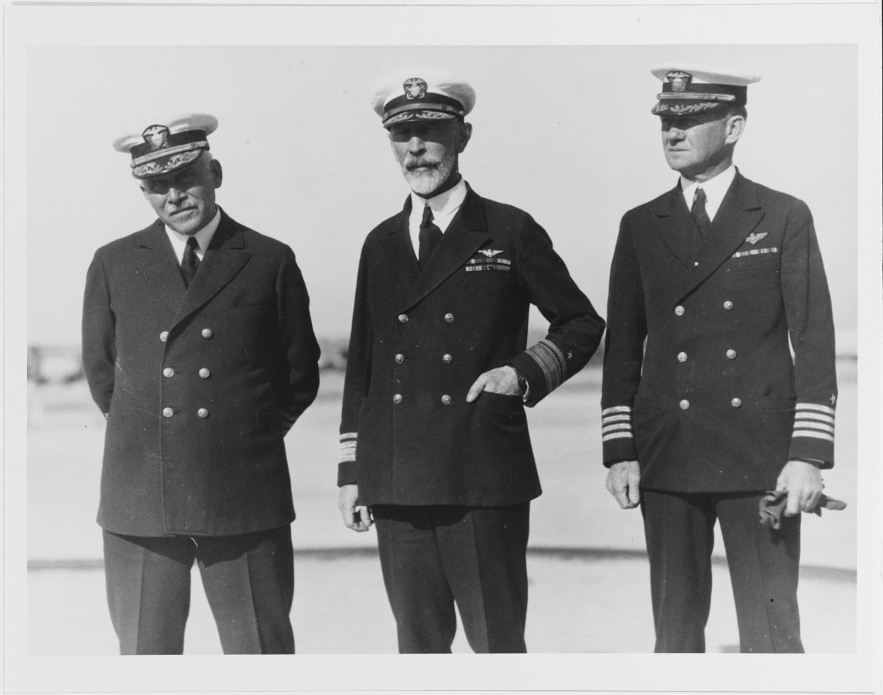 Photo #: NH 75877  Admiral William V. Pratt, USN Rear Admiral Joseph M. Reeves, USN Captain Frank R. McCrary, USN
