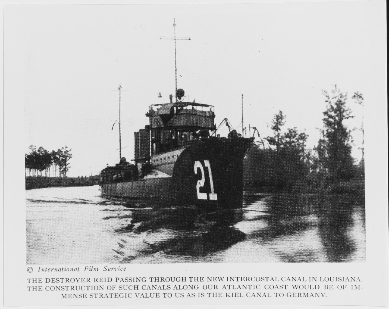 USS REID (DD-21) passing through the Intercoastal Canal, in Louisiana, circa 1916.