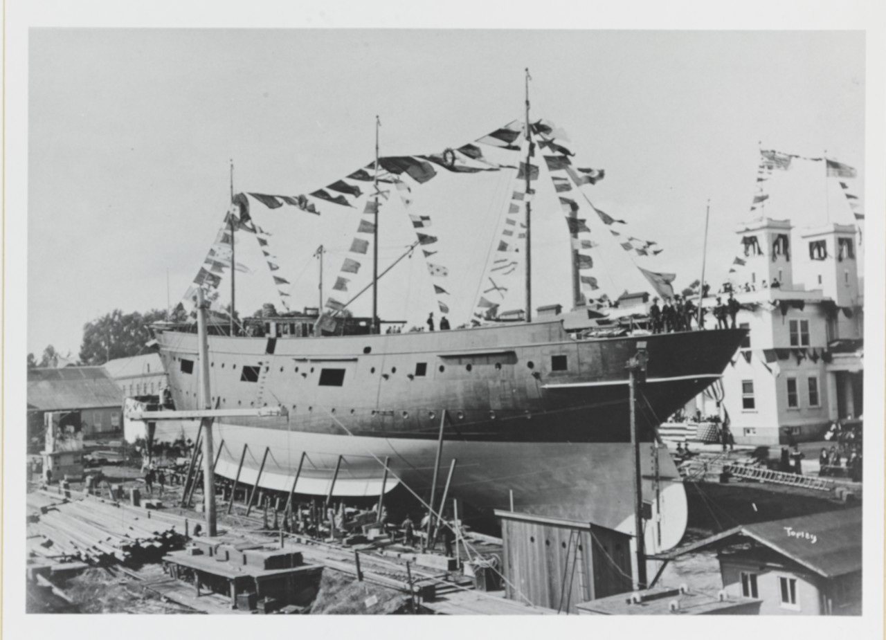USS INTREPID (1904-1921) with celebratory pennants and flags