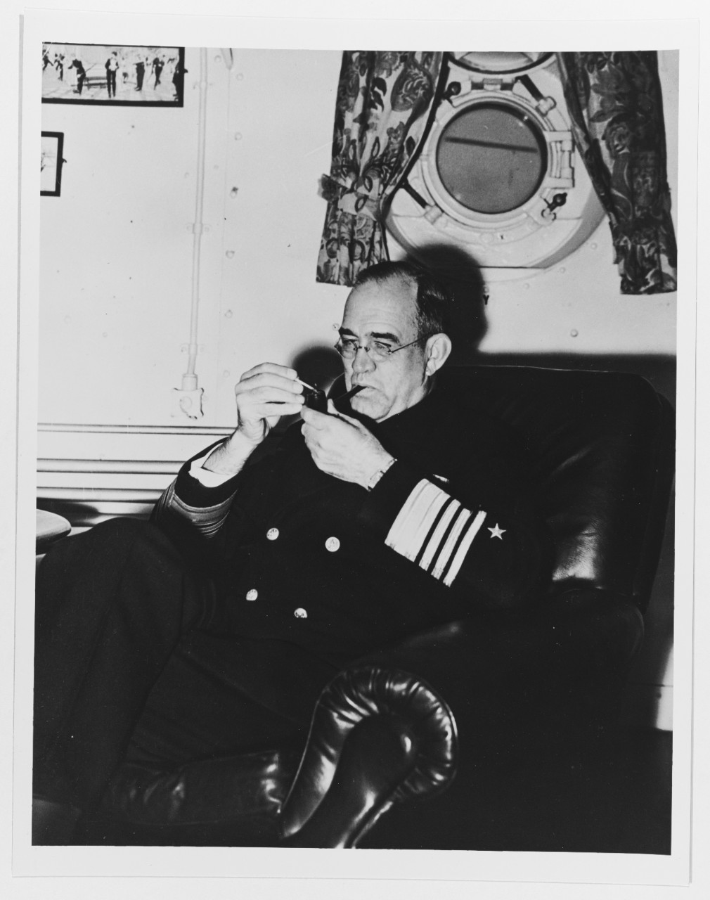 Admiral James O. Richardson, USN, relaxes on board his flagship.