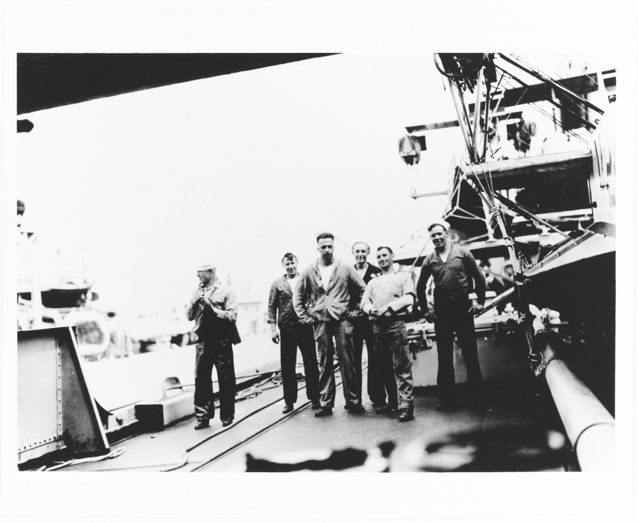 Crewmen on deck, aboard USS CUYAMA (AO-3)