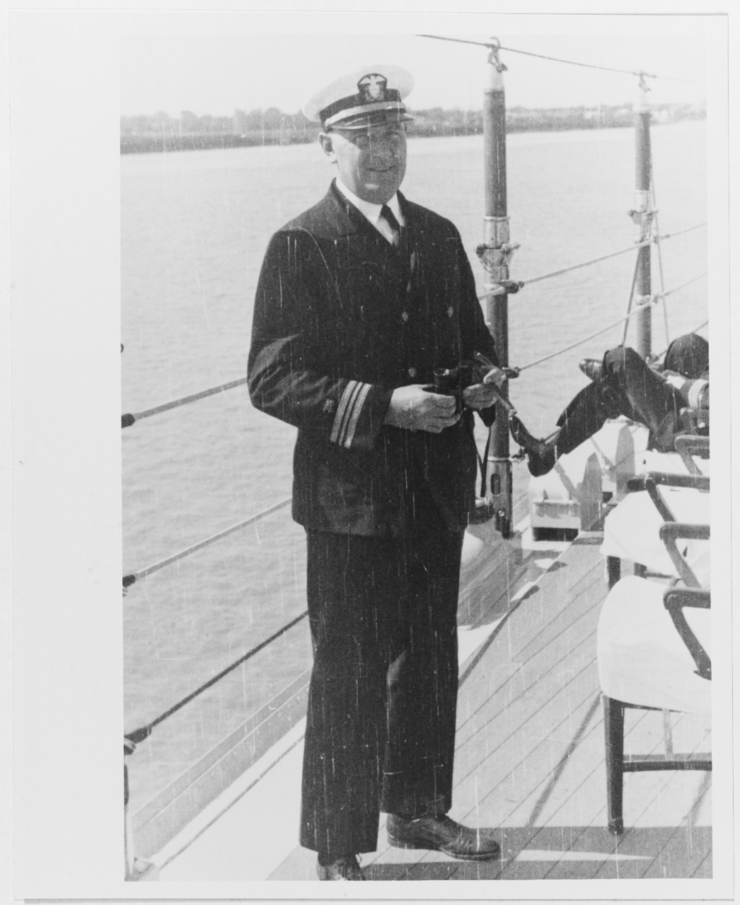 Lieutenant Commander J.E. Wood (Supply Corps), USN