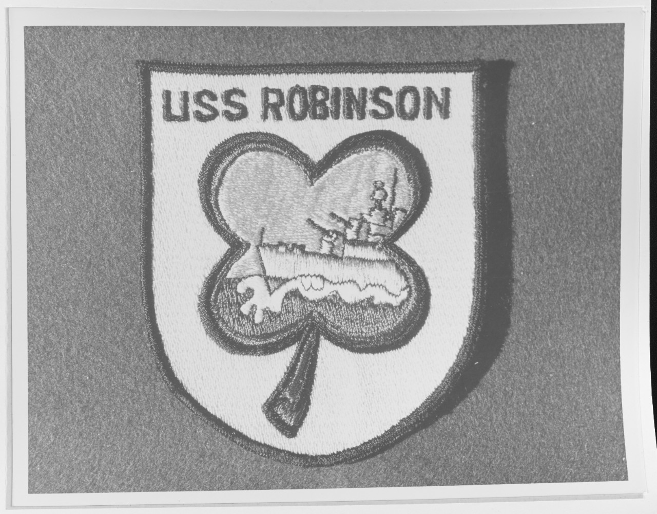 Photo #: NH 81462-KN Insignia: USS Robinson (DD-562)