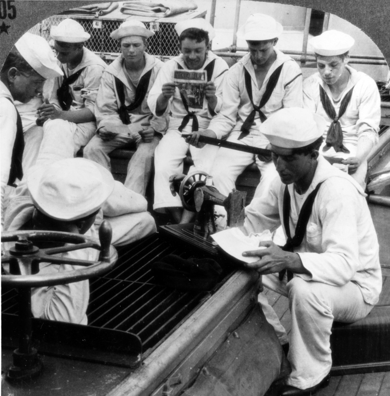 Photo #: NH 85292  &quot;A Sailor's Sewing Day Reminds Him Keenly of Home and Mother -- Life on Board a Battleship&quot;