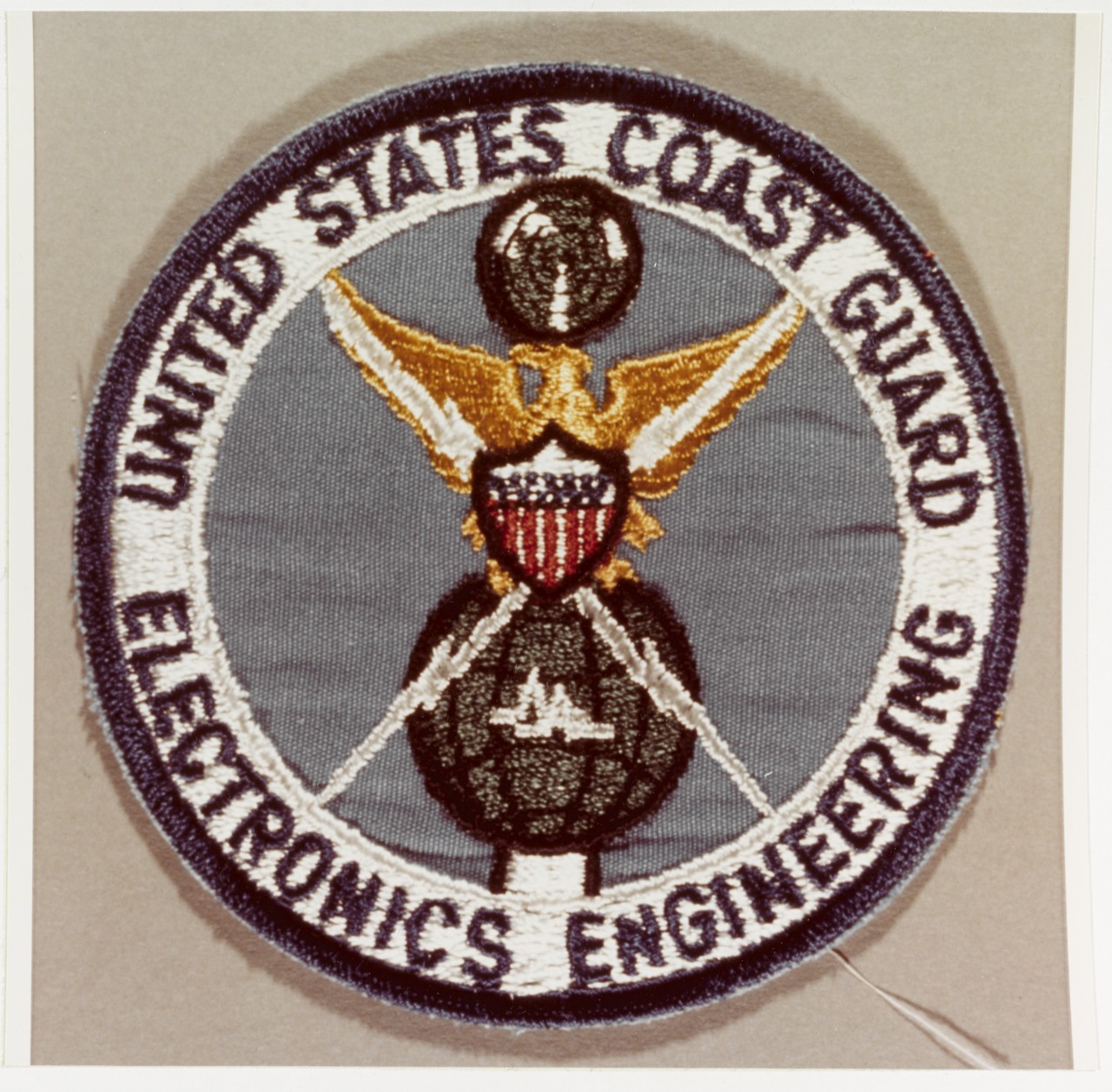 Insignia:  U.S. Coast Guard Electronics Engineering Office, Coast Guard Headquarters, Washington, D.C.