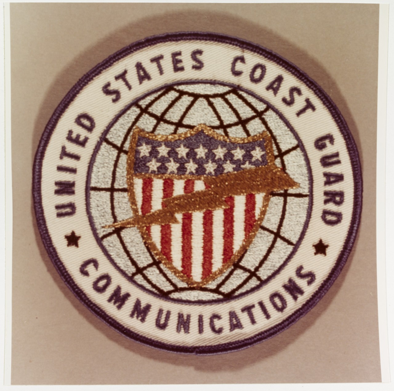 Insignia:  U.S. Coast Guard Communications Office, Coast Guard Headquarters, Washington, D.C.