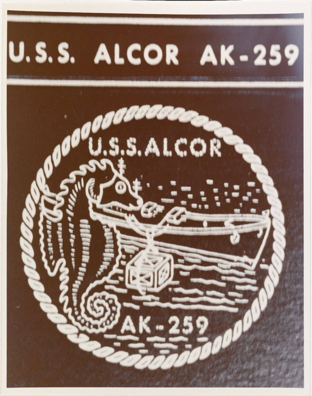Insignia: ALCOR (AK-259)
