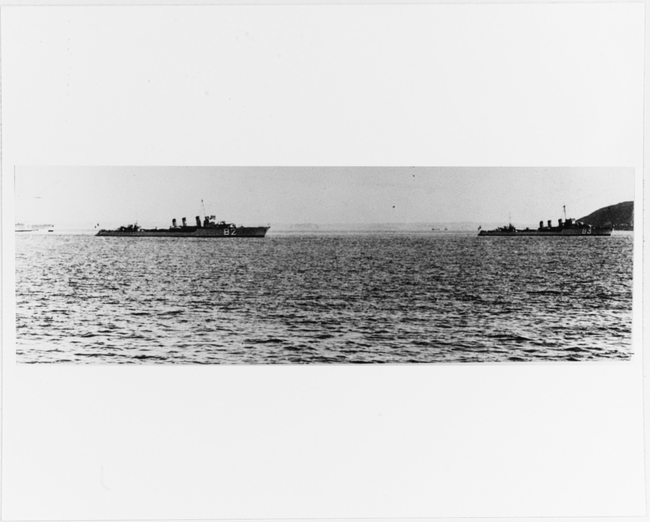 Two French "1500-ton" type destroyers making a port call before World War II.