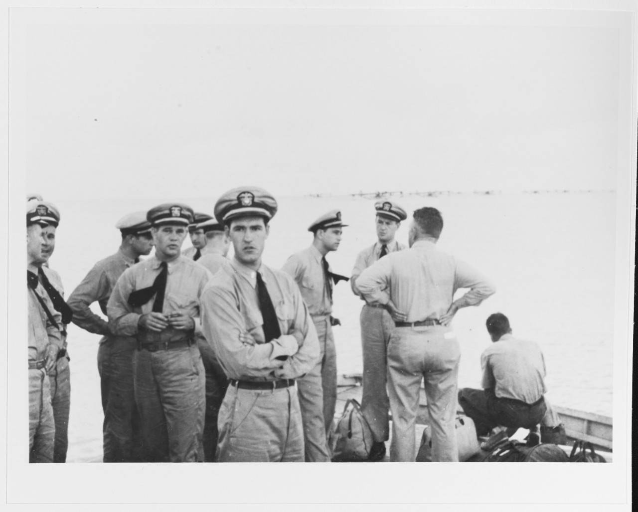 Ensign Lester Pugh, USNR (in foreground)