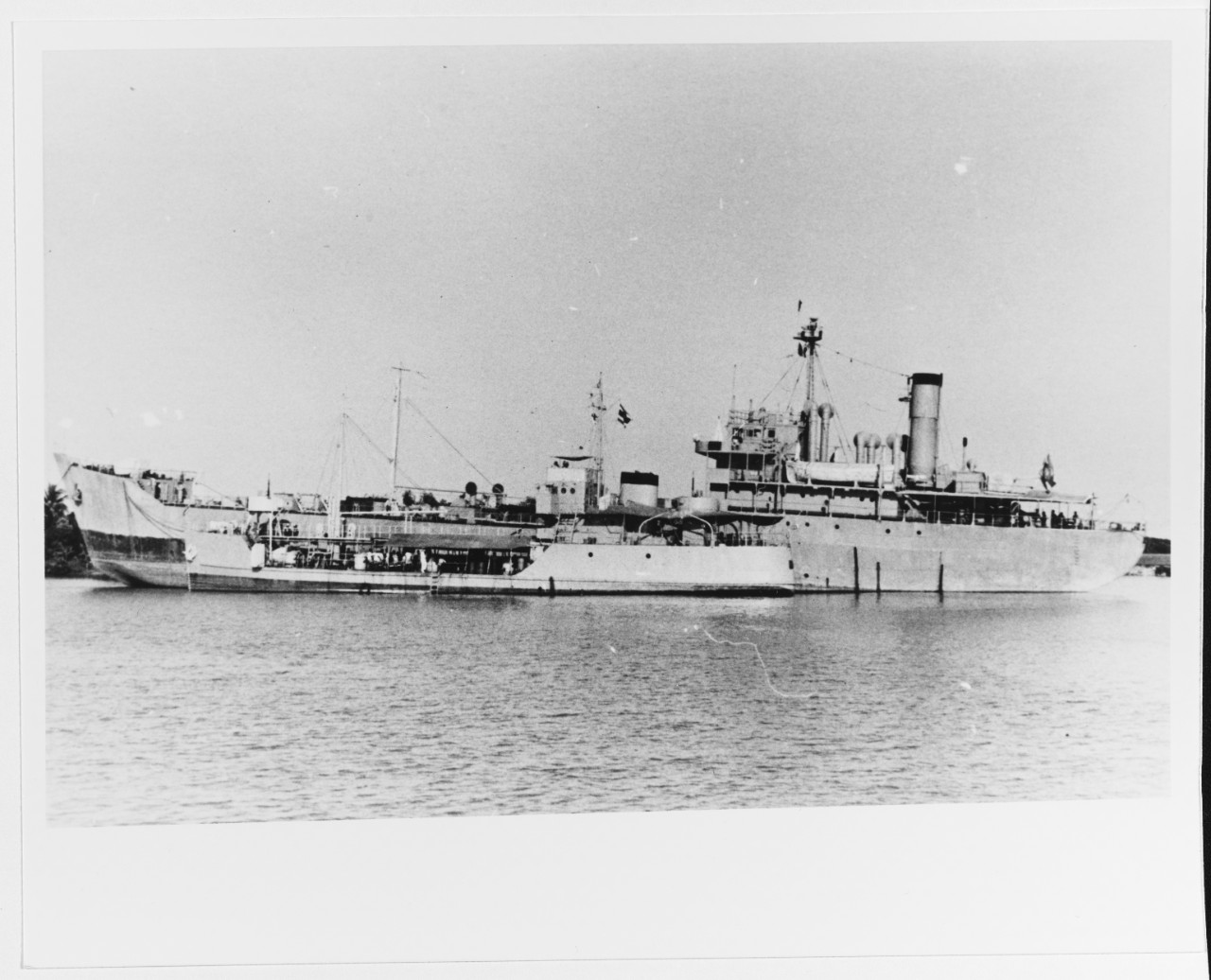 SAMUI (ex- U.S. Navy YOG-60, 1944) and MATRA (ex-Japanese WAKAKASA MARU, 1945) (background)