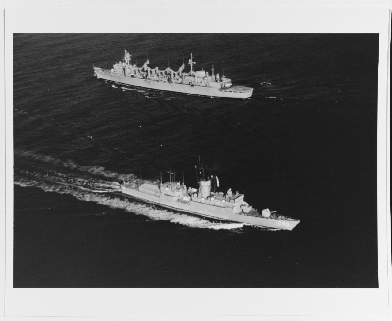 USS PAUL (DE-1080) passes USS DETROIT (AOE-4)