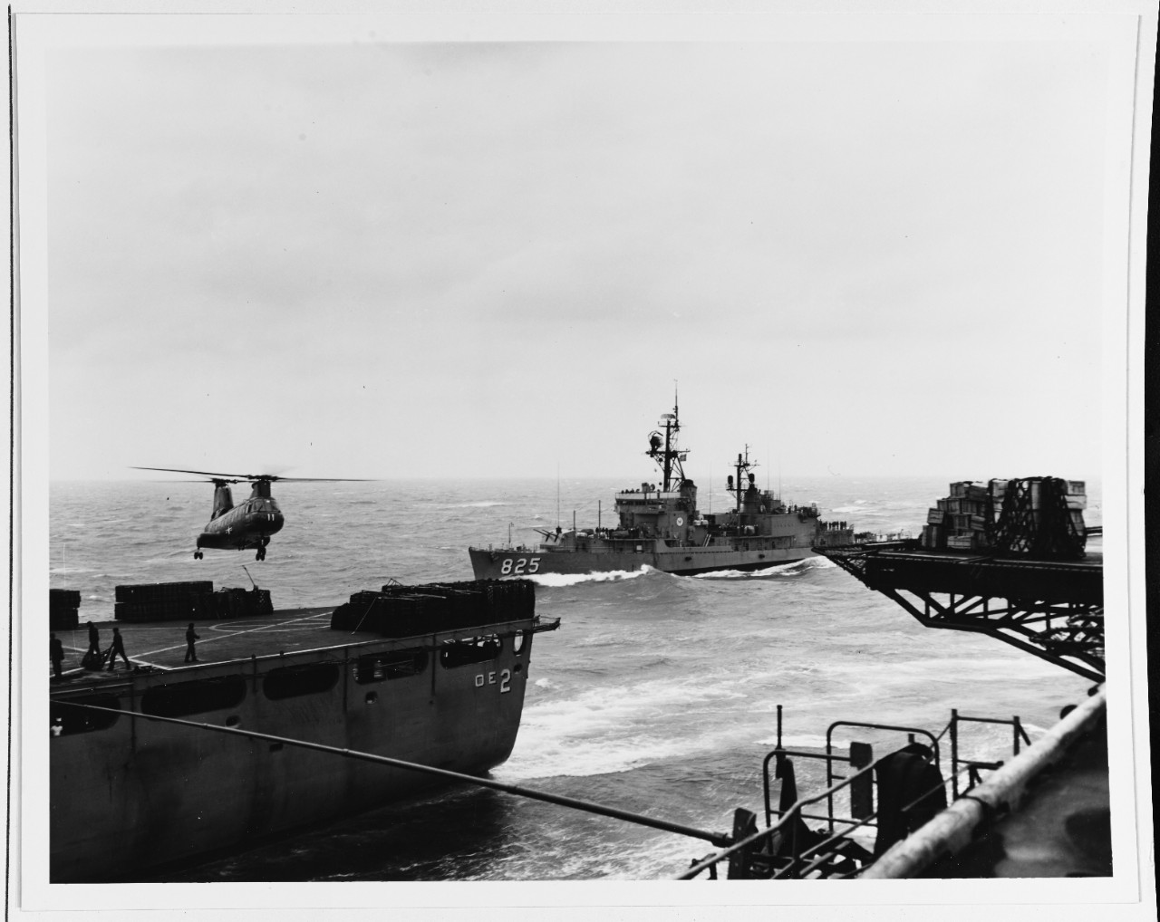 USS CAMDEN (AOE-2) Resupplies USS CARPENTER (DD-825) and USS HANCOCK (CVA-19)