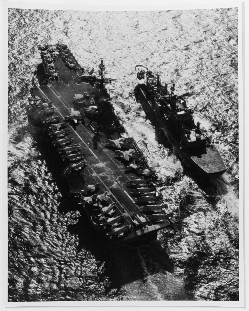 USS CORAL SEA (CVA-43) and USS NIAGARA FALLS (AFS-3)