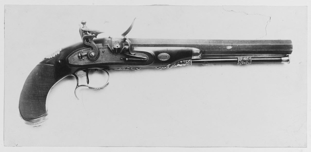 Pistol, one of a set of two