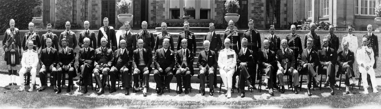 Guests of honor at Toronto Centennial Luncheon at Government House, Toronto, Canada, on July 4, 1934. American guests of honor include RADM William D. Leahy, LCDR F. McManamon, LCDR von Heimburg, Colonel C. Morrow, Maj. Gen. G.M. Wilson, and Chaplain G.E. Norton. All present are identified on the reverse side of the image.