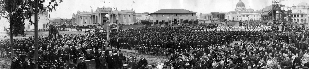 View of assembling crowd at the Enlisted Men's Dedication Ceremonies at the Panama-Pacific International Exposition, San Francisco, CA, April 8, 1915. RADM Charles F. Pond is in the VIP box. Note the many Exposition buildings in the background. From the collection of RADM Charles F. Pond. 