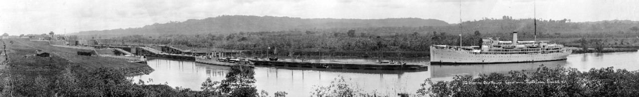 Oversize panoramic of USS Farquhar (DD-304) and USS Relief (AH-1) entering the Gatun Locks in the Panama Canal, June 11, 1927.