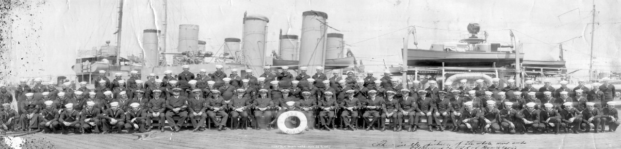 Officers and crew of USS Borie (DD-215) posing alongside their ship at the Norfolk Navy Yard, May 26, 1927.